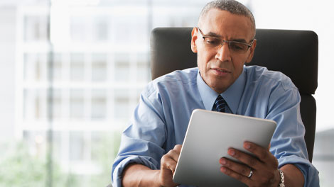 Photo of man at desk